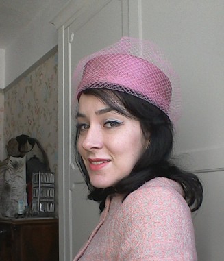 Pink pill box hat with net - front